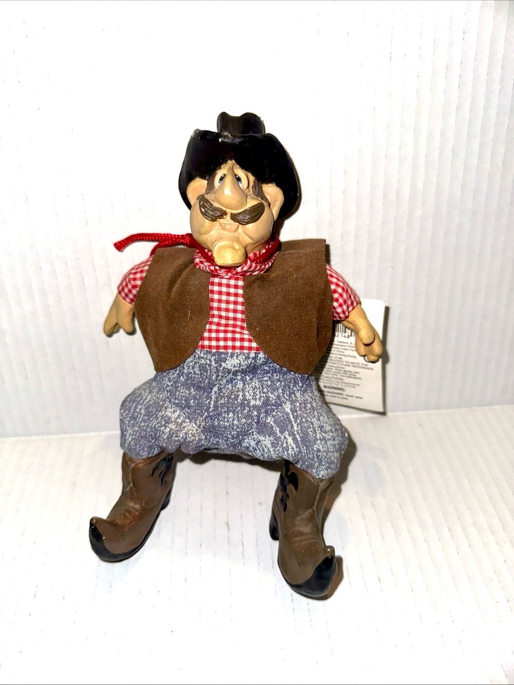 Vintage Chaps with tag. Sitting Cowboy Plush Doll with Brown Vest and Black Hat
